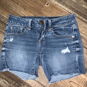 Blue jean ripped shorts